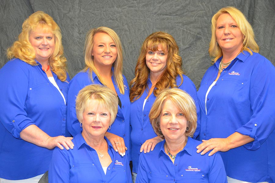 About Our Agency - Staff Photo of Brown's Insurance Agency, With Six Team Members All Wearing Blue Shirts and Standing Together